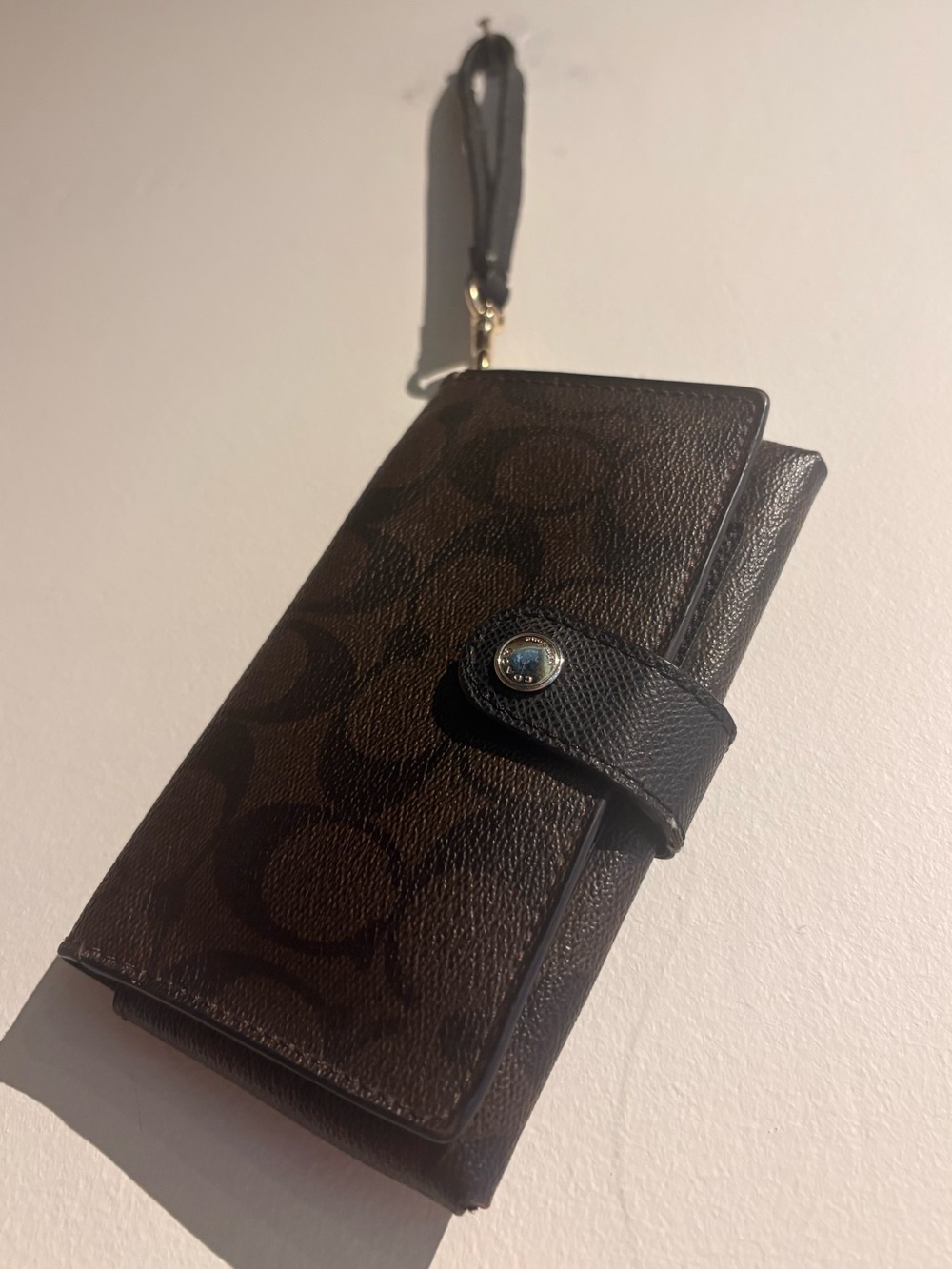 Brown coach wristlet